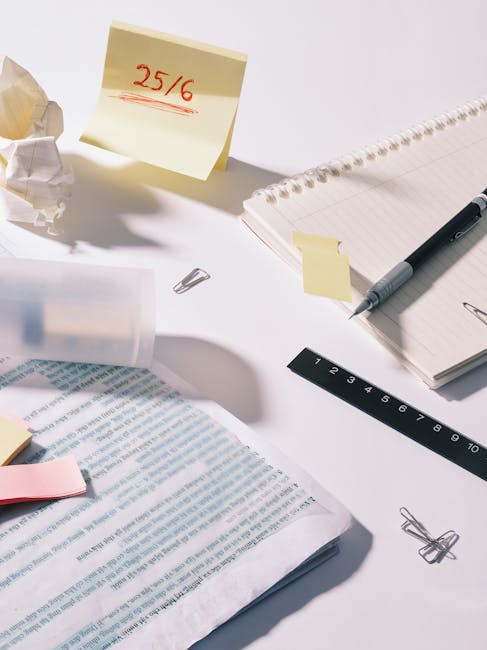 Desk with notes and planning tools marked 25/6